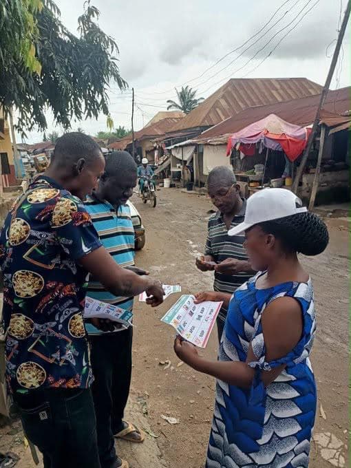 Ambassadors canvassing door to door on a street during the campaign.
