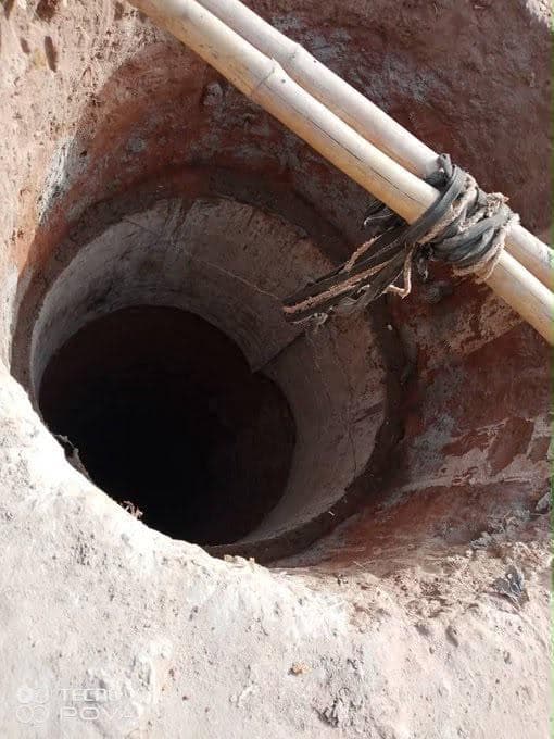 The shaft of a hand-dug well during construction.